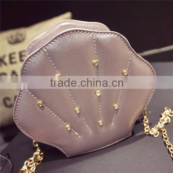 Wholesale stylish shell pattern ladiess pu chain bag with shining diamond