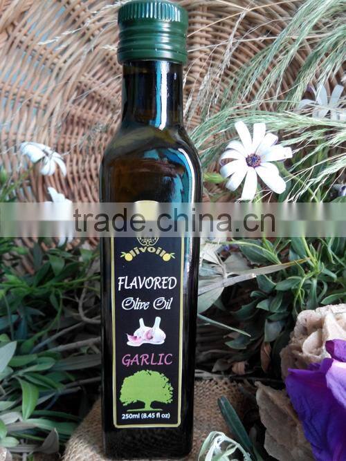 Flavored Olive Oil with Garlic. Premium Quality Olive Oil with ISO9001 Certification. Glass Bottle 250 ml.