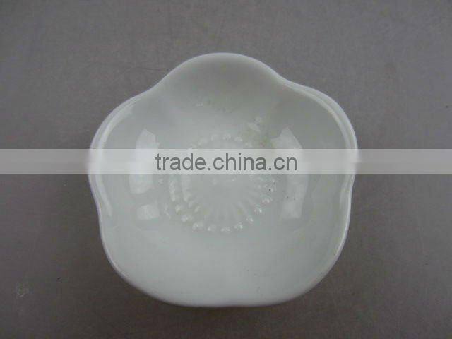 Stock white porcelain flower shaped sauce dish