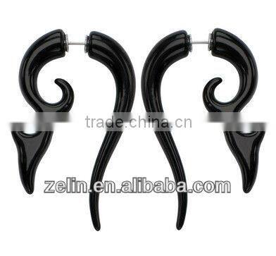 A fake spiral ear rings stretchers in black acrylic body jewelry