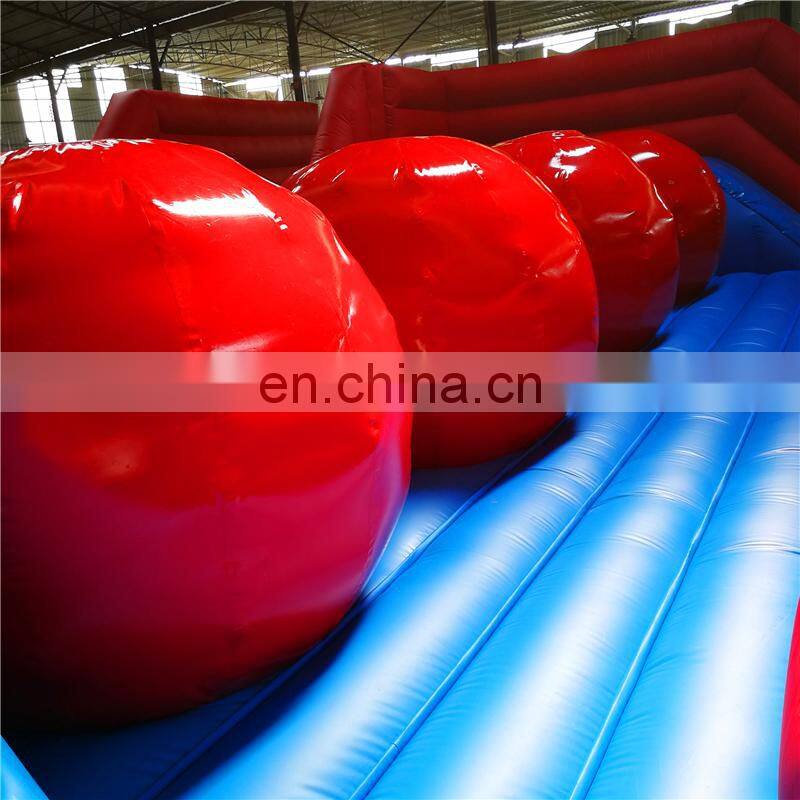 Outdoor mobile Blow up meltdown game inflatable wipeout ball course for sale
