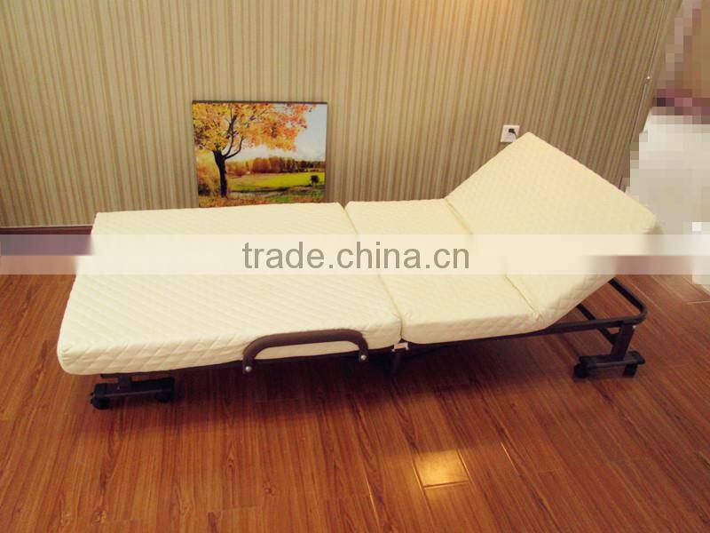 white guest room metal folding bed