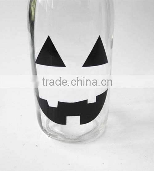 black skull head decorate glass bottle for juice or liquior with metal lid straw