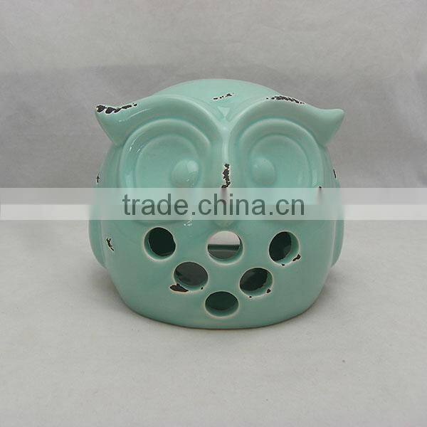 Ceramic owl shaped lanterns