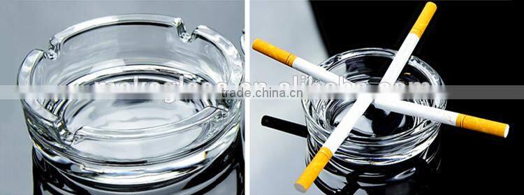 clear glass ashtray with different size square and round shape