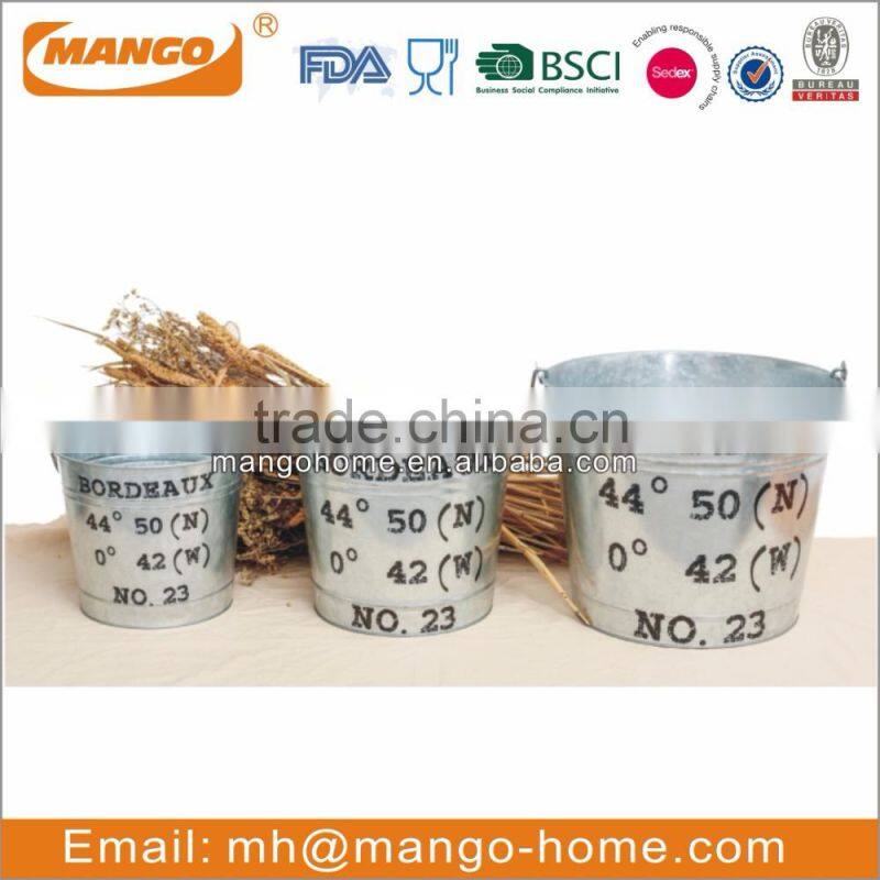 Large black galvanized metal beer bucket