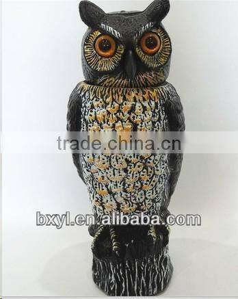 cute smart garden owl with plastic bobbling head activated moving by wind action