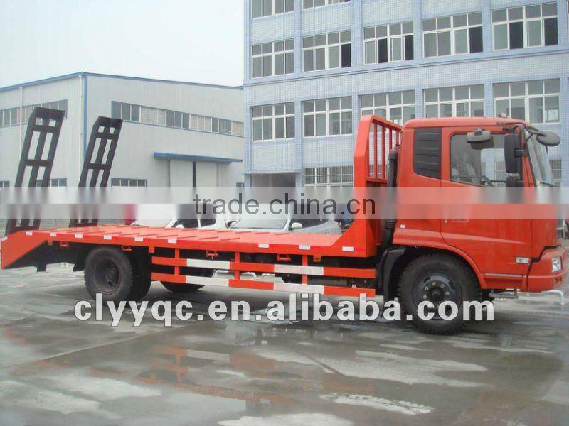 flat bed construction machine transport truck