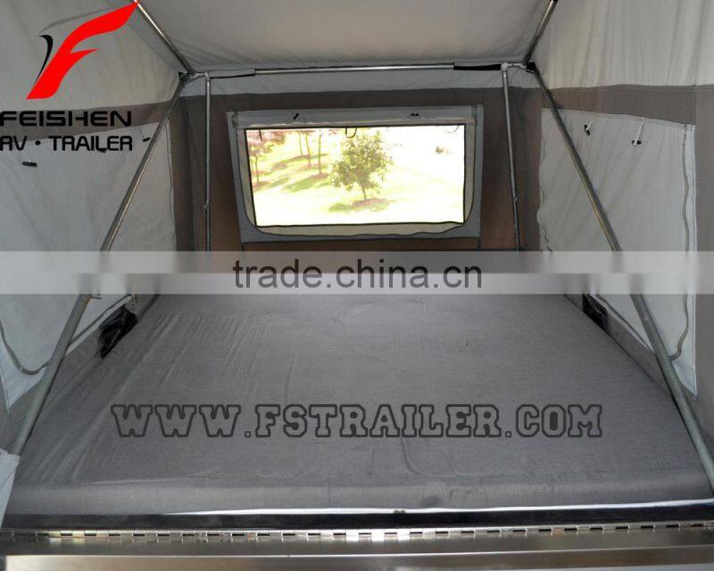 Off-road style foward folding hard floor travel camper trailer with independent suspension and kitchen system