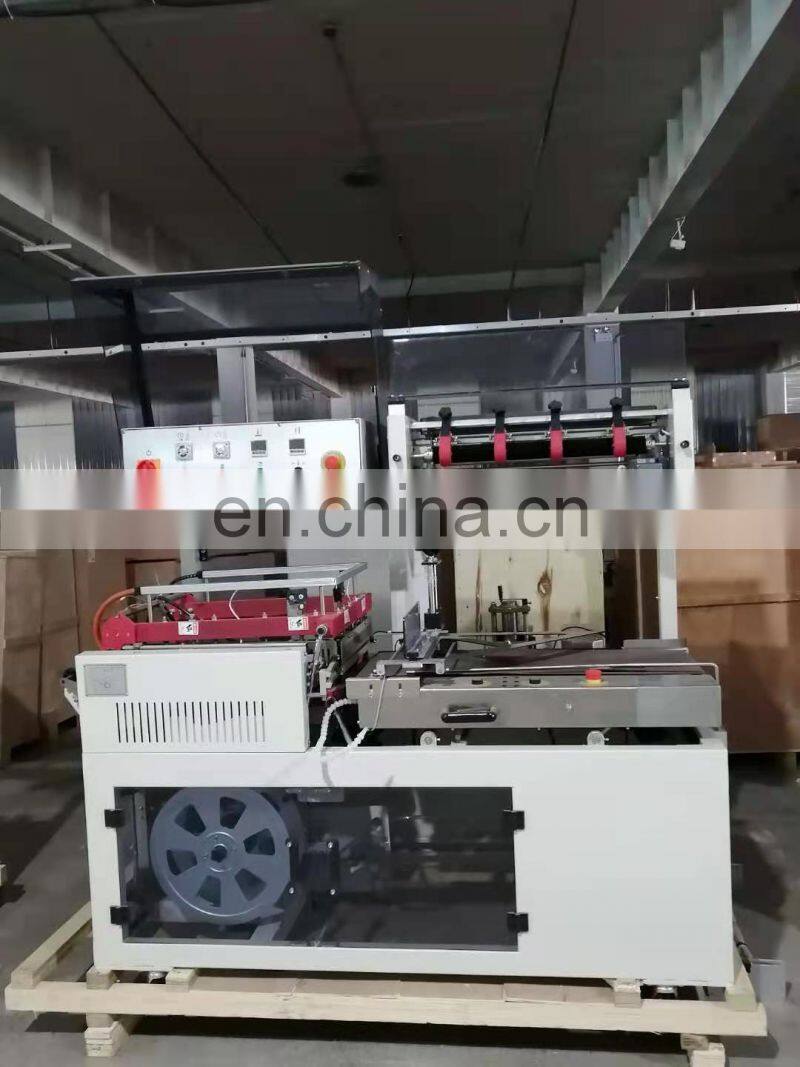 Automatic express gift box book film sealing and shrinking machine