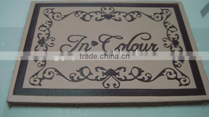 engraved decorate garment brown leather patch