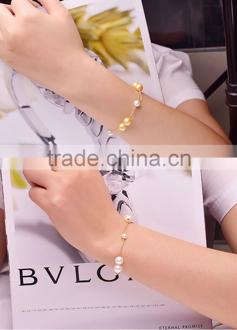 akoya cultured pearls bracelet with white/golden pearls in 18k gold chain