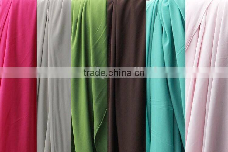 very cheap 100%polyester weft knit fabric embossed for laptop bag, handbag, suitcase surface, etc