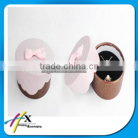 Bright yellow small plastic watch box with pillow