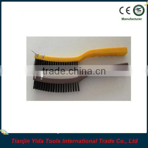 black wire brush with plastic handle