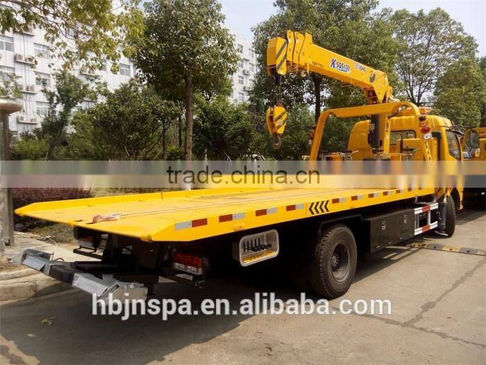 right hand drive yellow color Flatbed Wrecker truck With Crane 5ton