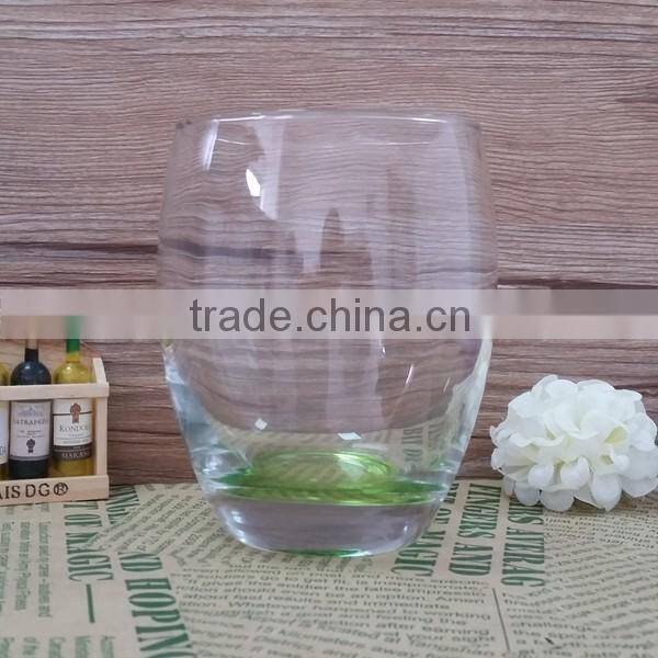 Clear egg shape glass tumbler with 400ML capacity and color bottom