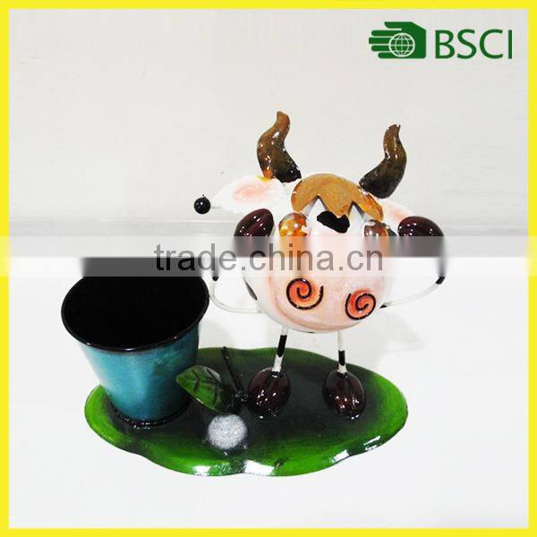 Adorable metal cow ornament for stores