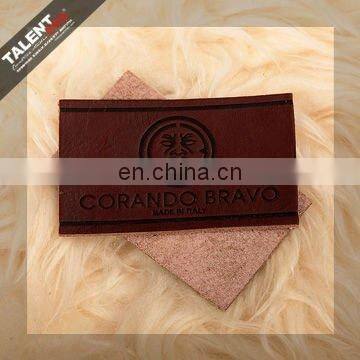 high quality customized private brand name logo jeans genuine leather patch in garment
