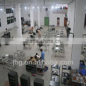 Automatic L-bar shrink wrap machine