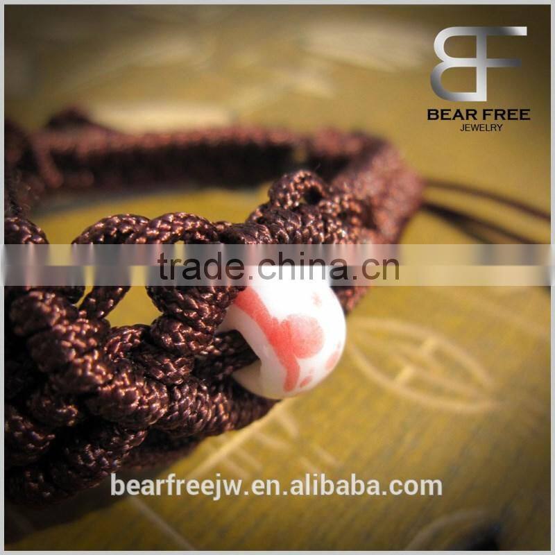 Ethnic 3 Colors Rose Flowers Women's Ceramic Friendship Bracelet with Dark Blue braided rope