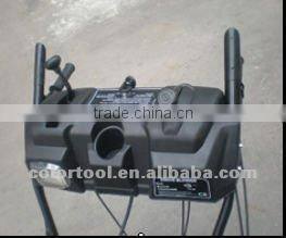 Two-stage track snow thrower