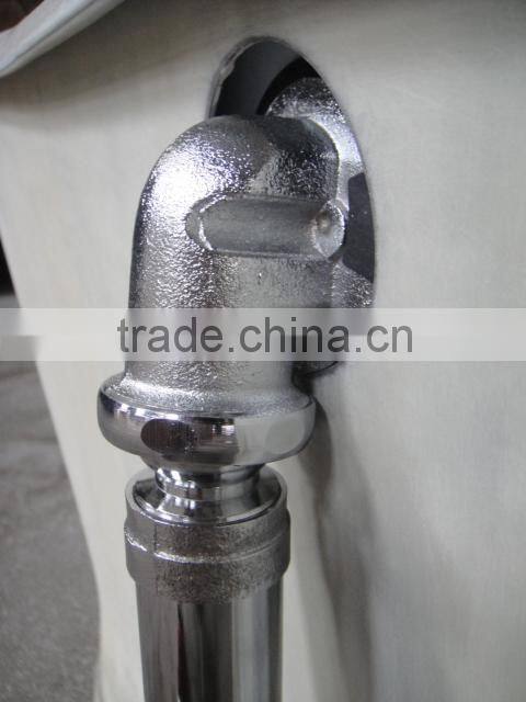 exposed overflow and drain for freestanding baths