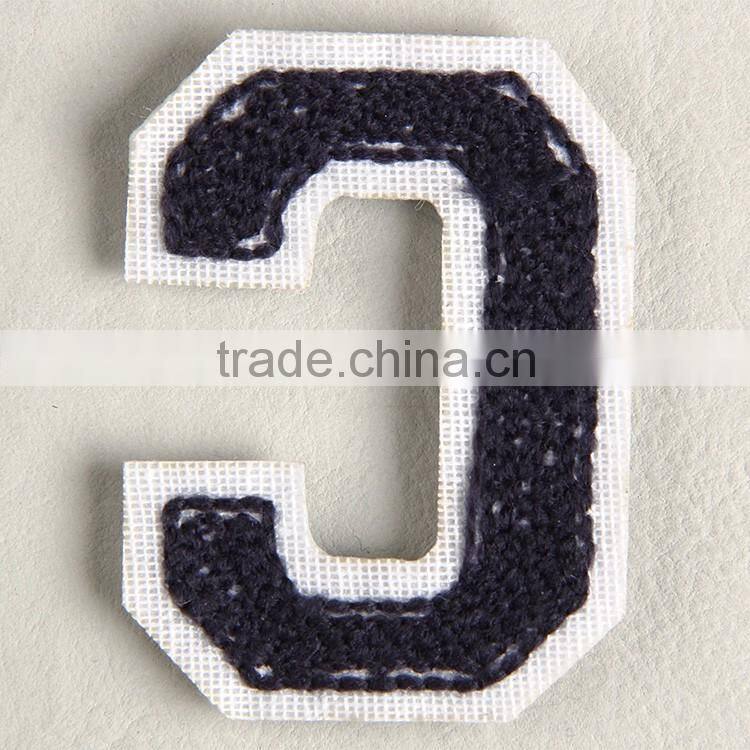 Knitting woolen yarn embroidery label made from China label factory for broadloom carpet and bedding sets