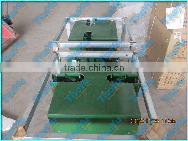 Garlic tail and stem cutting machine