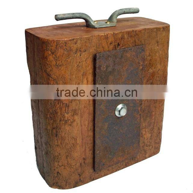 older aged wooden door stop