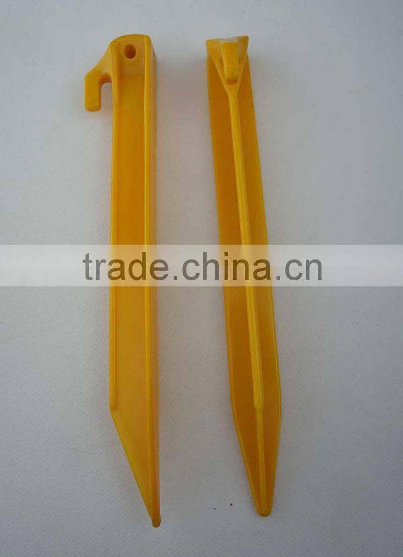 56712# 9" yellow plastic tent pegs