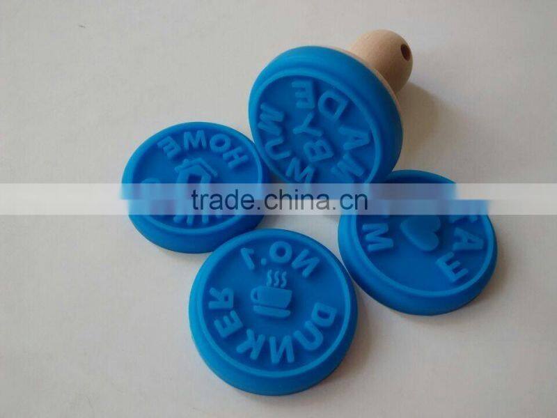 interesting silicone cookie stamp with wooden handle
