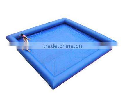 inflatable swimming pool floating on water deployed