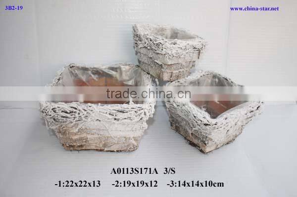 handmade birch basket with falling snow