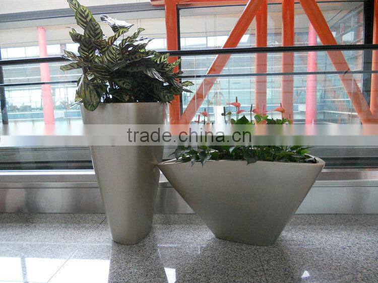 Gold fiberglass planter