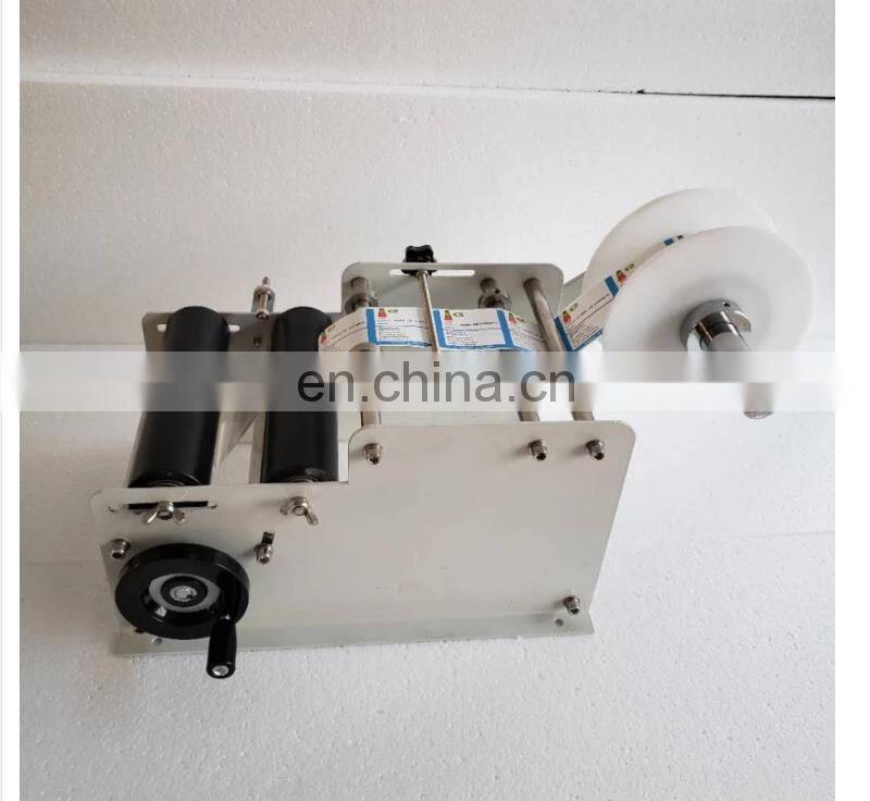 YTK-L100 handheld hand held manual round bottle labeling machine for bottle used,manual round bottle labeler