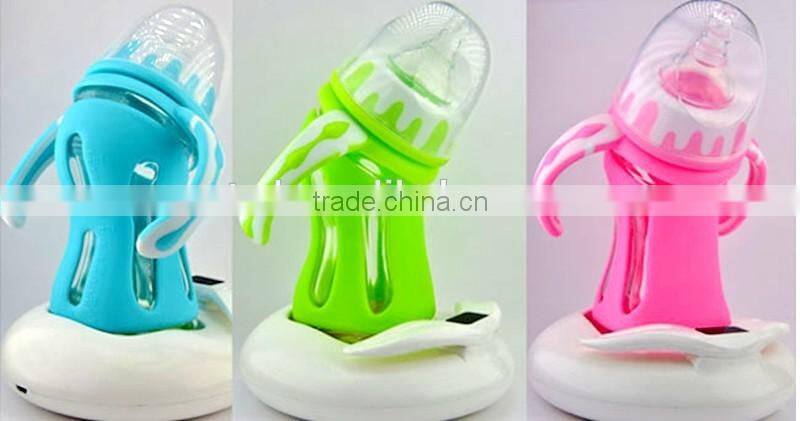 Imitating breast milk feeding design glass baby feeding bottle pink green bule color with temperature sensing base