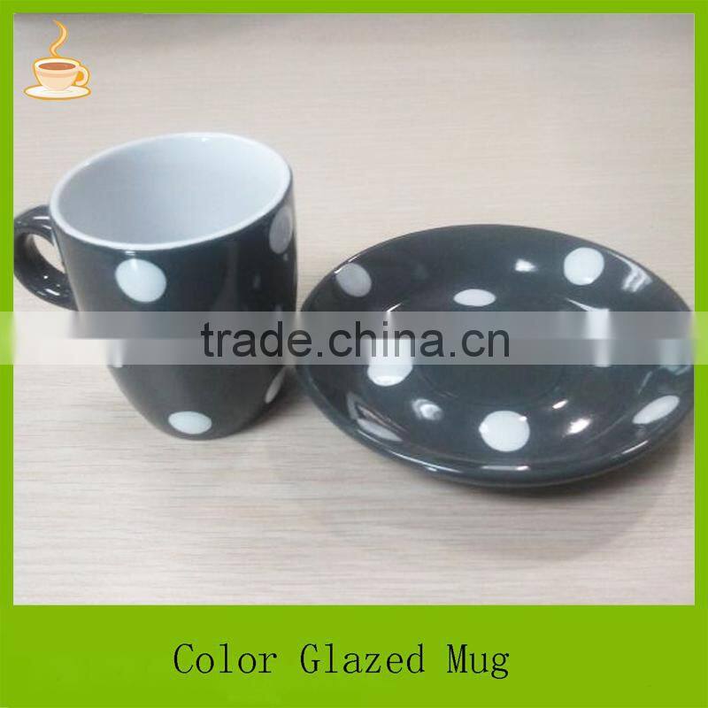 Samll size porcelain coffee mug with saucer set, black and green color glazed with white dots