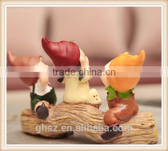 no listening, no seeing, no talk three "no" dolls