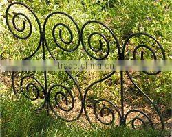 scrolled garden fence