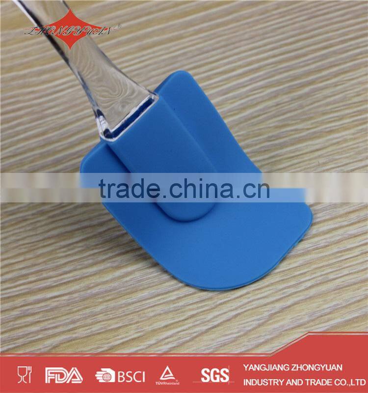 blue silicone spatula with plastic handle