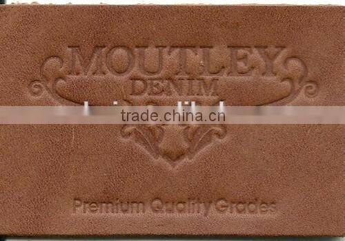 Custom embossed brown leather patch for jeans and shoes