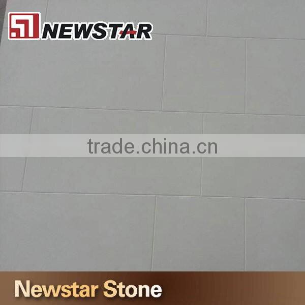 White cultured marble tub surrounds