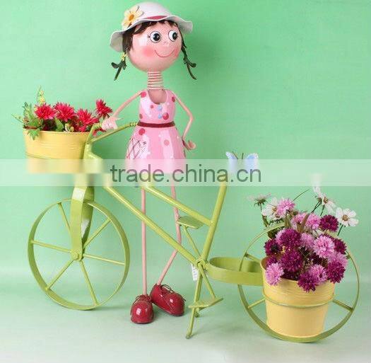 metal doll with flower used for home decor