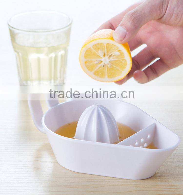 Plastic material food grade cheap simple creative orange squeezer wholesale
