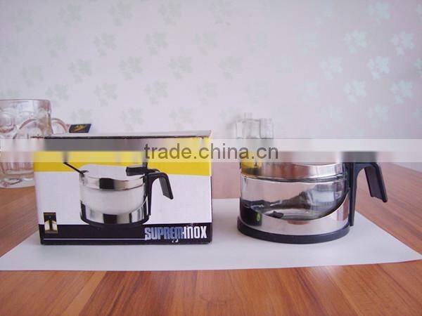 clear glass spice jar with spoon