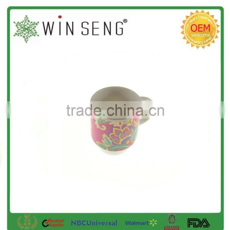 Colorful ceramic tea or coffee mug cup with ring