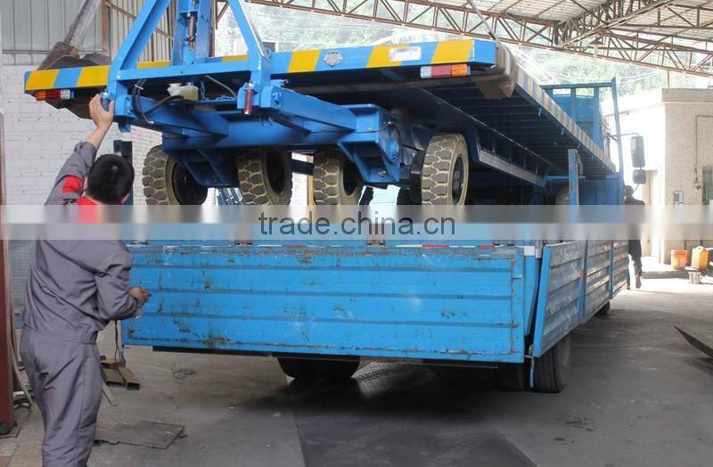 Double traction transport flatbed trailer