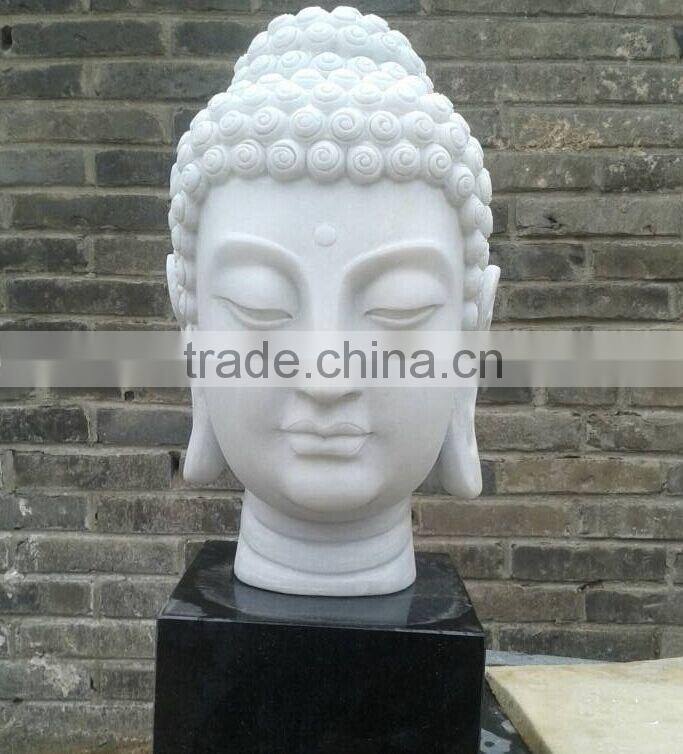 white marble stone buddha head