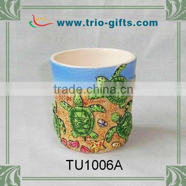Ceramic tea or coffee cup dolphin design